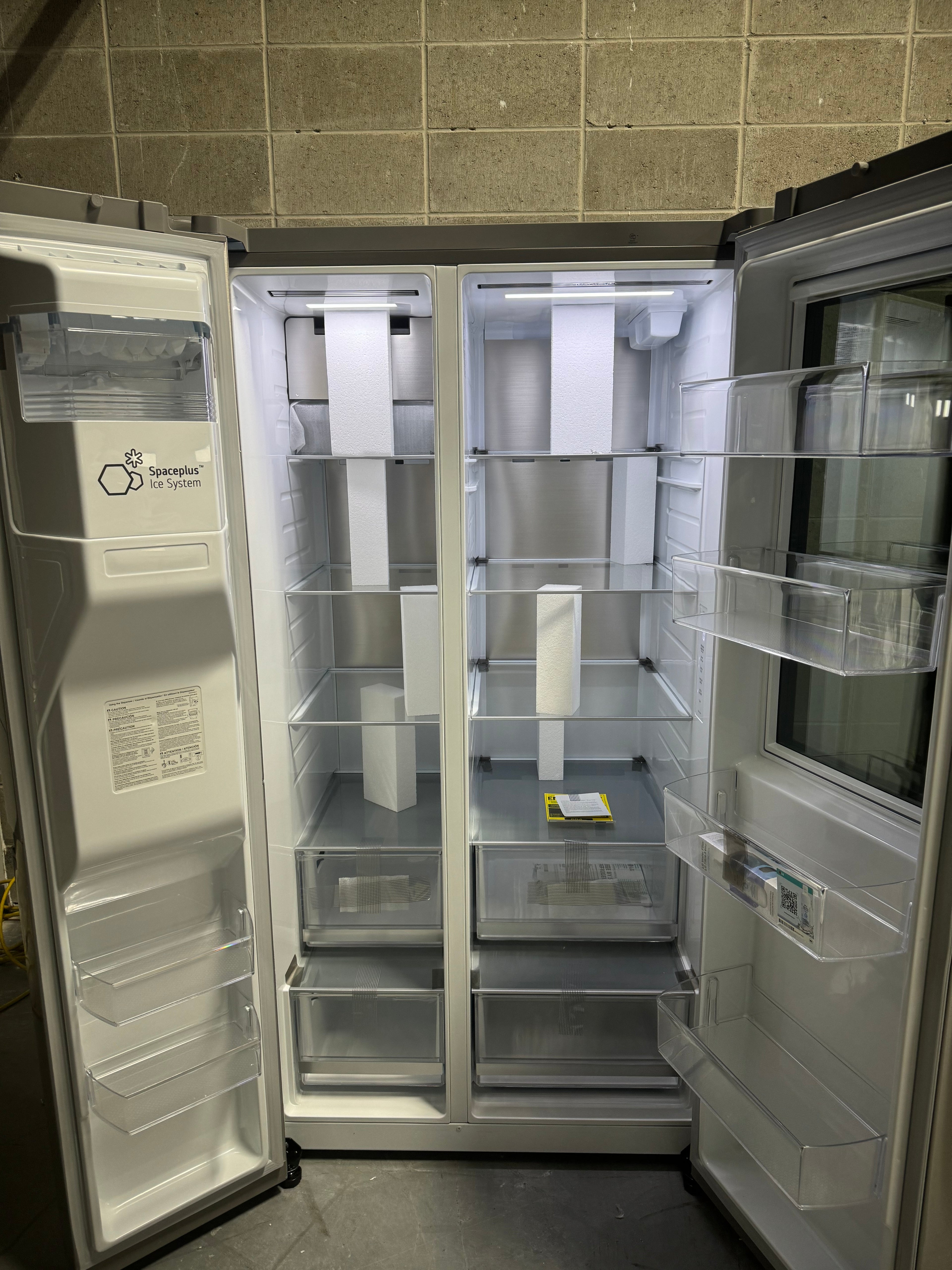 LG 27 Cubic ft. Refrigerator/Freezer